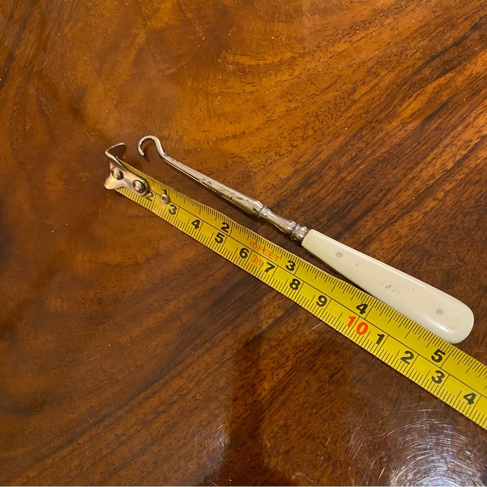 Rare Vintage Ivory & Silver coloured Boots or Ice Skates or Corset Lacing Hook
